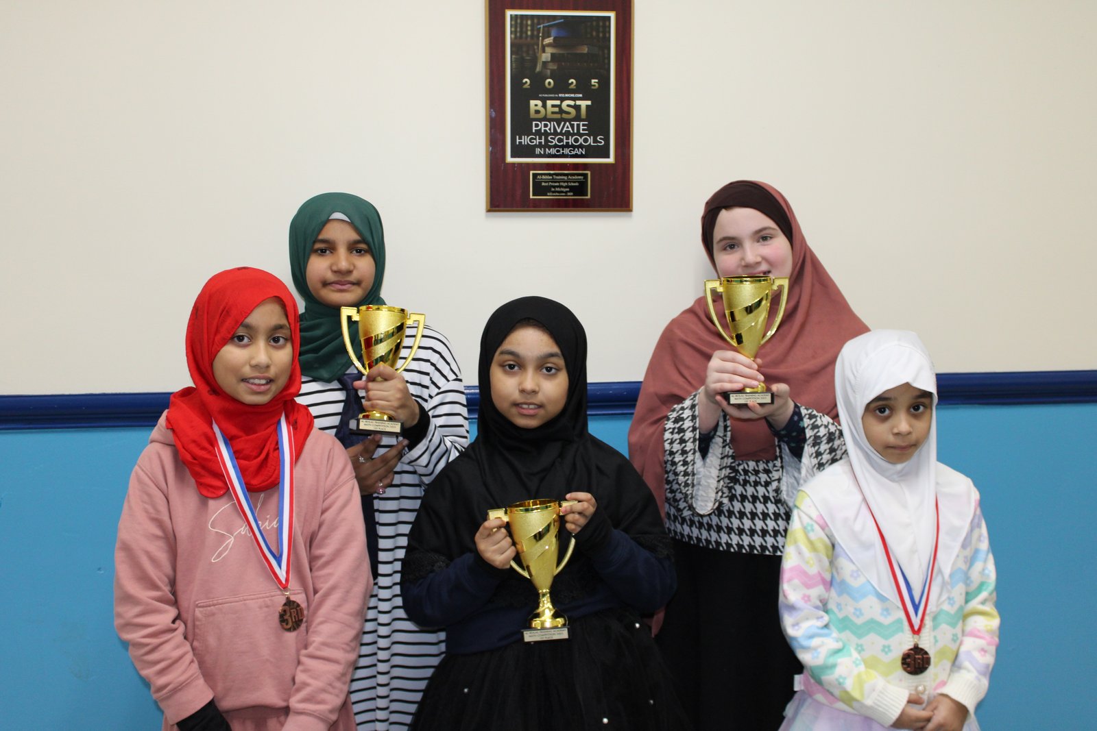 Students with trophy